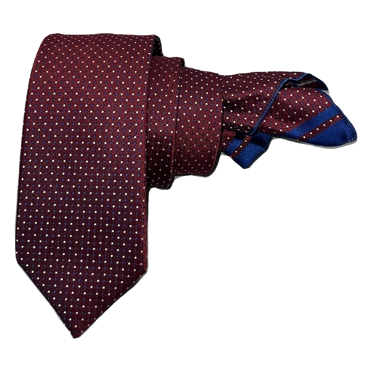 Corbata granate con dibujo parliament y punto en gris. Pañuelo a juego con ribete parliament.