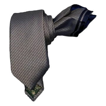 Corbata efecto tornasol en ocre claro con marino. Pañuelo a juego con ribete marino.