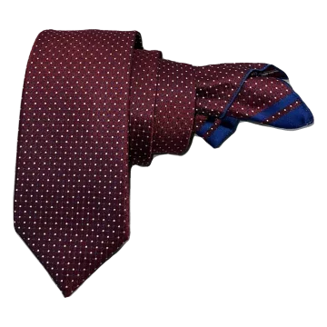Corbata granate con dibujo parliament y punto en gris. Pañuelo a juego con ribete parliament.
